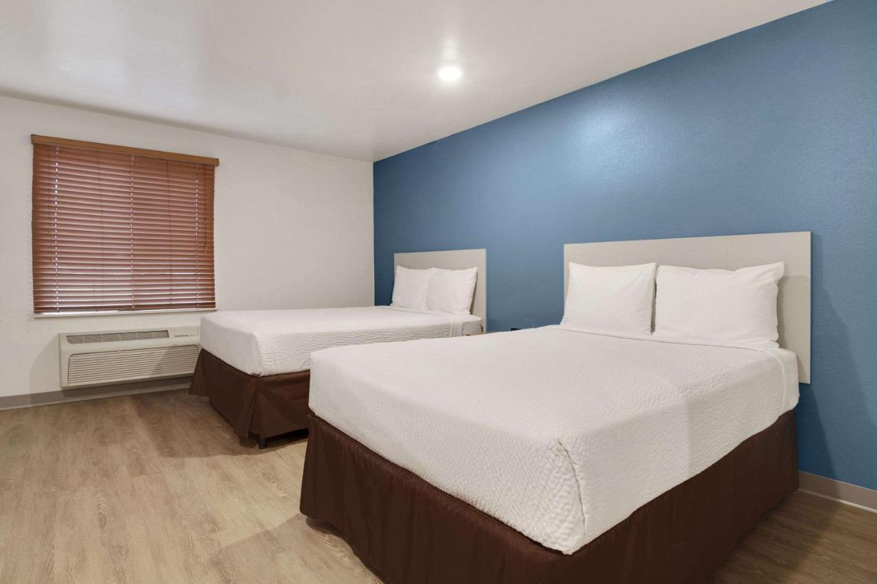 Woodspring Suites Conroe Exterior photo