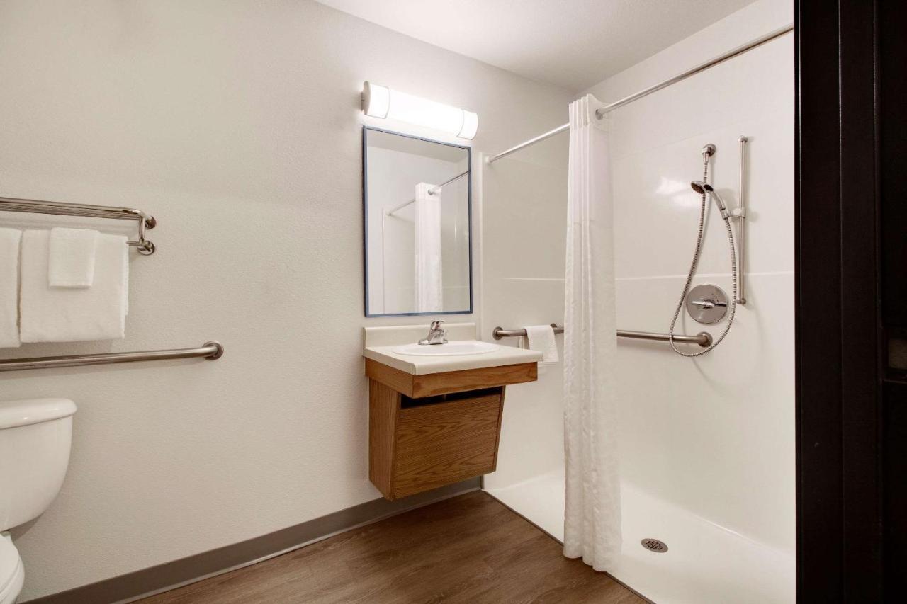 Woodspring Suites Conroe Exterior photo