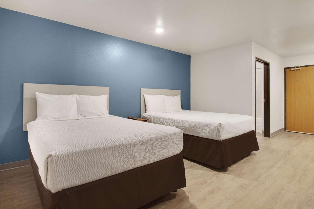 Woodspring Suites Conroe Exterior photo